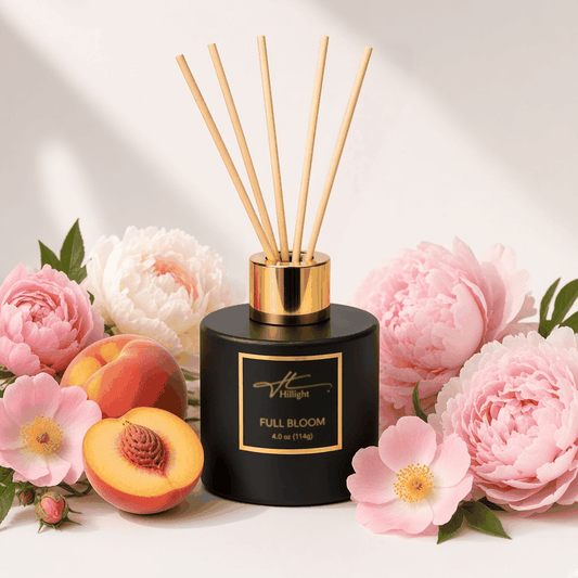 Full Bloom reed diffuser with reeds wild rose peony and peach scent