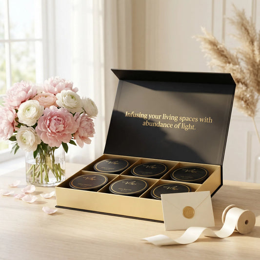 Hillight six luxury travel candles displayed with fresh flowers