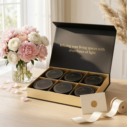 Hillight six luxury travel candles displayed with fresh flowers