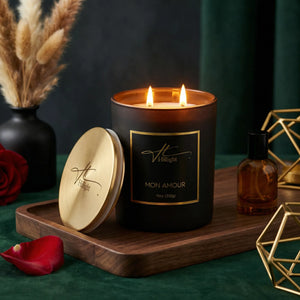 Mon Amour coconut soy blend wax candle burning with warm amber glow